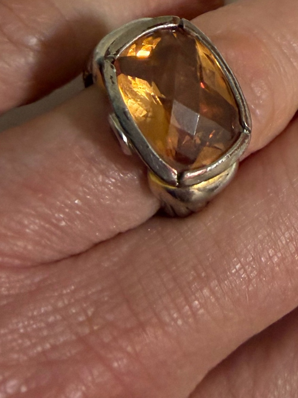 Silver colored Ring with faceted faux stone. Approx 6-3/4